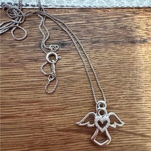 Silver played angel necklace